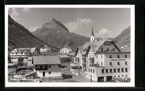 AK Galtür, Ortsansicht mit Alpenhaus