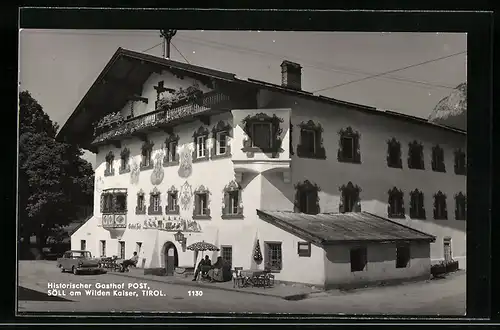 AK Söll am Wilden Kaiser, Gasthof Post mit Gästen und Strasse