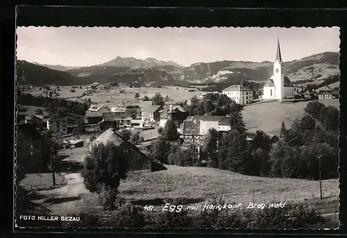 AK Egg, Strasse und Ortsansicht mit Blick auf Gebirgskette