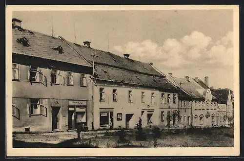 AK Bochov, Strassenpartie mit Geschäftshäusern