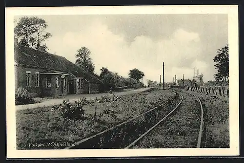 AK Fulkum /Ostfr., Ortspartie mit Blick zur Mühle