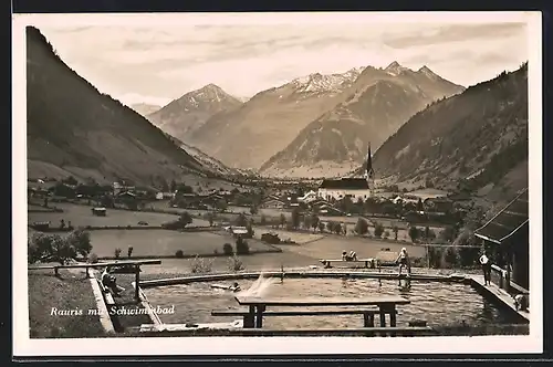 AK Rauris, Ortsansicht mit Schwimmbad und Kirche