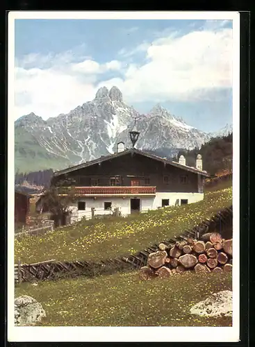 AK Filzmoos, Bauernhof gegen ein Bergmassiv