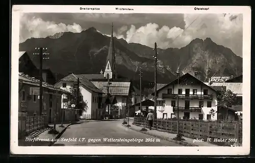 AK Seefeld i. T., Dorfstrasse mit Blick zum Wettersteingebirge