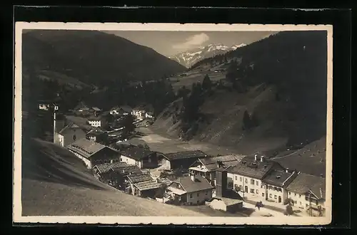 AK Gries a. Brenner, Ortsansicht in den Bergen