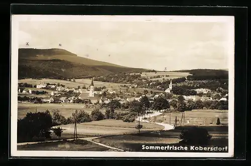 AK Kobersdorf, Ortsansicht mit zwei Kirchen