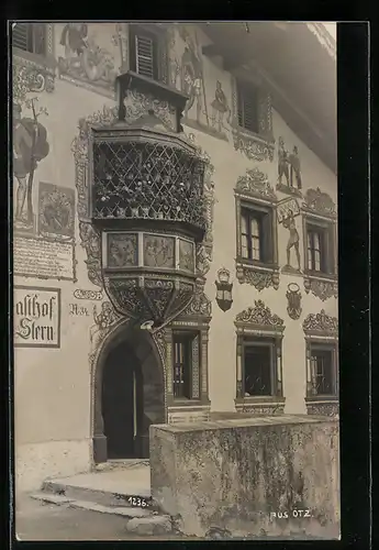 AK Ötz, Eingang zum Gasthof Stern, verzierte Fassade und Hausnummer 34