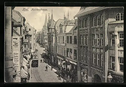 AK Kiel, Holstenstrasse mit Geschäften und Strassenbahn