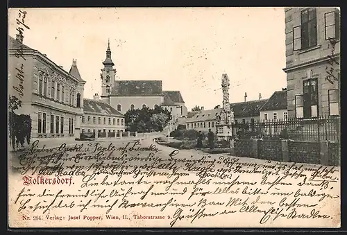 AK Wolkersdorf im Weinviertel, Strassenpartie mit Blick auf die Kirche