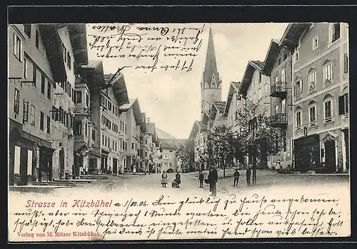 AK Kitzbühel, Strassenpartie mit Blick zur Kirche