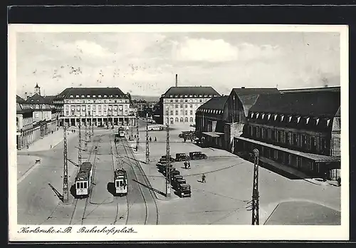 AK Karlsruhe i. B., Strassenbahnen vor dem Hauptbahnhof am Bahnhofsplatz