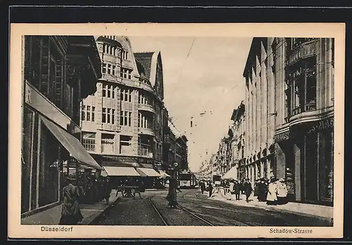 AK Düsseldorf, Schadow-Strasse, Strassenbahn, Geschäft Damen Confection