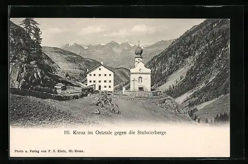 AK Hl. Kreuz im Oetztale, Kirche und Gebäude gegen die Stubaierberge