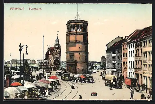AK Düsseldorf, Burgplatz mit Geschäften, Turm und Strassenbahn