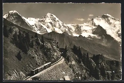 AK Interlaken, Bergbahn vor Eiger, Mönch und Jungfrau