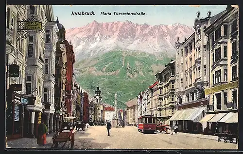 AK Innsbruck, Strassenbahn auf der Maria Theresienstrasse, Geschäft Papier Tschoner