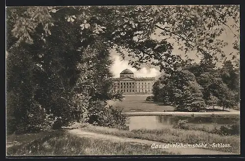 AK Cassel-Wilhelmshöhe, Schlossansicht hinter Bäumen