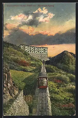 AK Bergbahn fährt im Sonnenaufgang zum Stanserhorn-Hotel