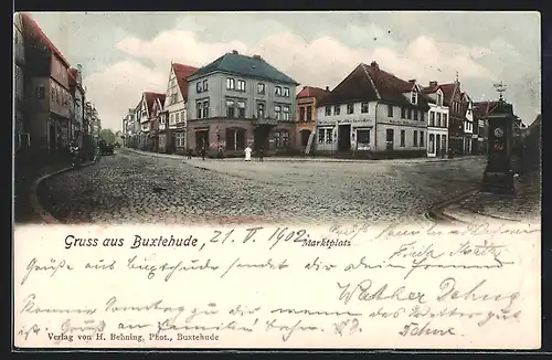 AK Buxtehude, Strasseneck am Marktplatz mit Wettersäule