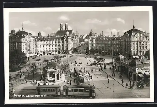 AK München, Strassenbahnen auf dem Karlsplatzrondell