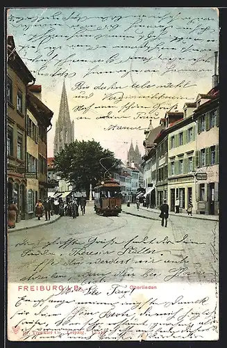 AK Freiburg i. Br., Strassenpartie Oberlinden mit Strassenbahn