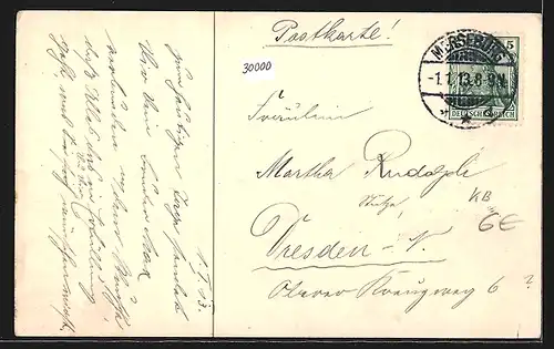 Künstler-AK Bergarbeiter sitzt auf einer vollen Lore