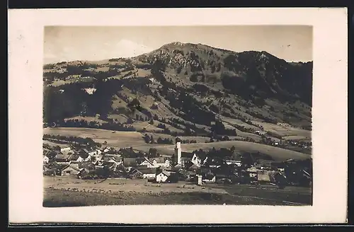 AK Rettenberg, Ortsansicht gegen Bergmassiv