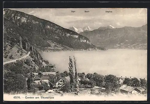 AK Gunten am Thunersee, Ortsansicht am Wasser gegen die Alpen