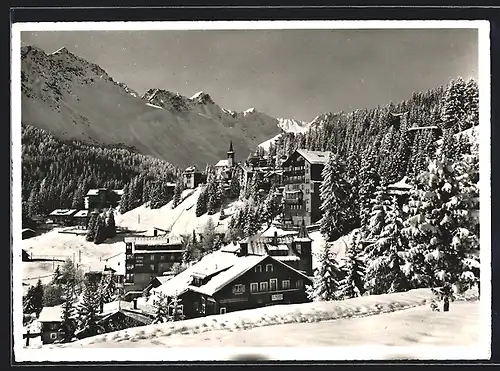 AK Arosa, Teilansicht im Schnee gegen Bergkette