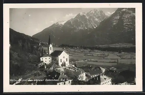 AK Dölsach, Ortsansicht mit Kirche und Lienzer Dolomiten