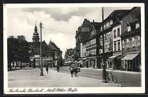 AK Karlsruhe-Durlach,  Strasse mit Geschäften