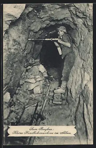 AK Bergarbeiter mit kleiner Handbohrmaschine bei der Arbeit