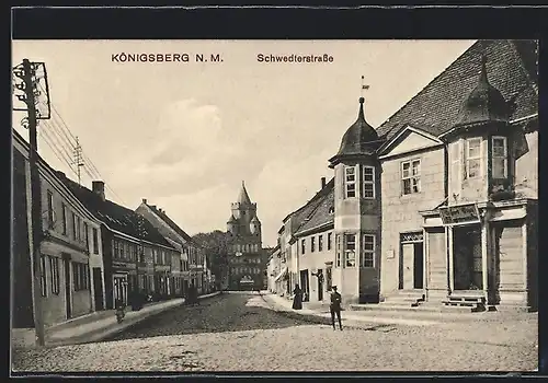 AK Königsberg /N.-M., Schwedterstrasse mit Geschäften