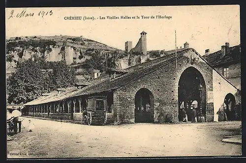 AK Crémieu, les vieilles halles et la tour de l`Horloge