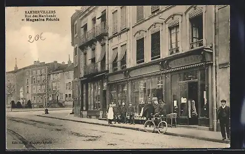AK Rambervillers, Rue des Marchands et Magasins Réunis