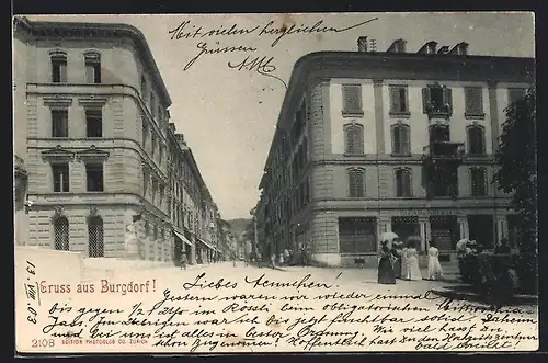 AK Burgdorf, Blick in eine Strasse mit Geschäften