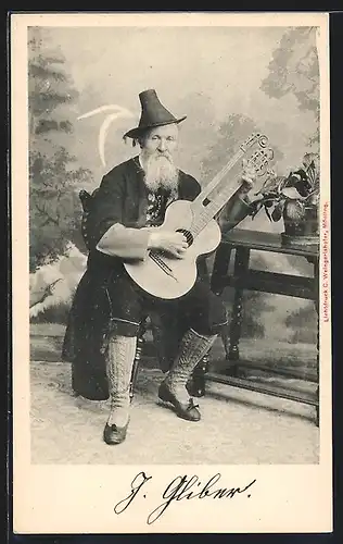 AK Mann in Tracht mit einer Gitarre