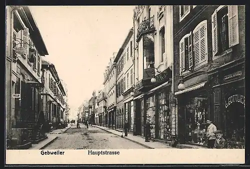 AK Gebweiler, Hauptstrasse mit Geschäften