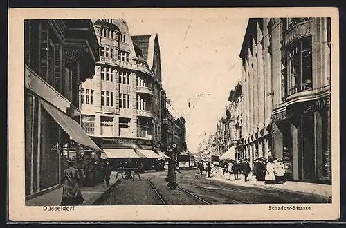 AK Düsseldorf, Schadow-Strasse, Strassenbahn, Geschäft Damen Confection