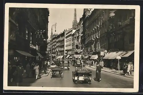 AK Wien, Kärntnerstrasse, reger Verkehr mit Autos und Bussen, volle Gehwege