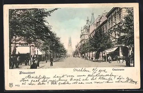 AK Düsseldorf, Oststrasse mit Geschäft C. Flies, Passanten und Kirche