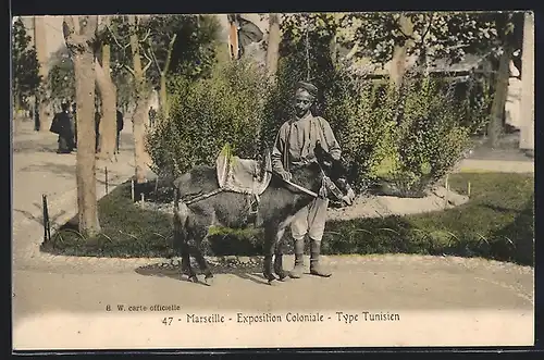 AK Marseille, Exposition Coloniale, Tunesier mit Turban und Maultier bei der Kolonial-Ausstellung