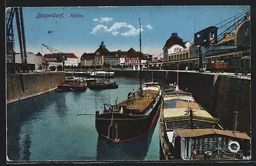 AK Düsseldorf, Hafen mit Lastenschiffe, Kräne und Kai