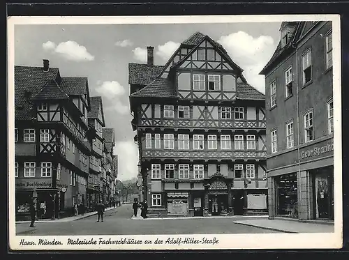 AK Hann.-Münden, Fachwerkhäuser mit Geschäften an der Strasse