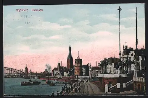 AK Düsseldorf, Partie am Rheinufer mit Passagierdampfer und Blick auf Kirche