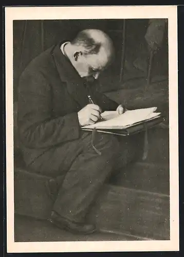AK Lenin beim Unterzeichnen eines Dokuments
