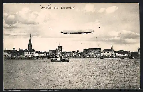AK Düsseldorf, Stadtpanorama mit fliegendem Zeppelin, Rhein