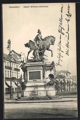 AK Düsseldorf, Kaiser Wilhelm-Denkmal und Geschäfte im Hintergrund