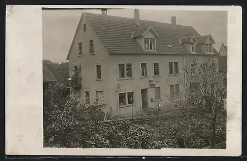 Foto-AK Bretten, Haus der Ortskrankenkassse aus der Vogelschau