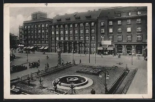 AK Mähr. Ostrau, Bahnhofstrasse mit kleiner Grünanlage